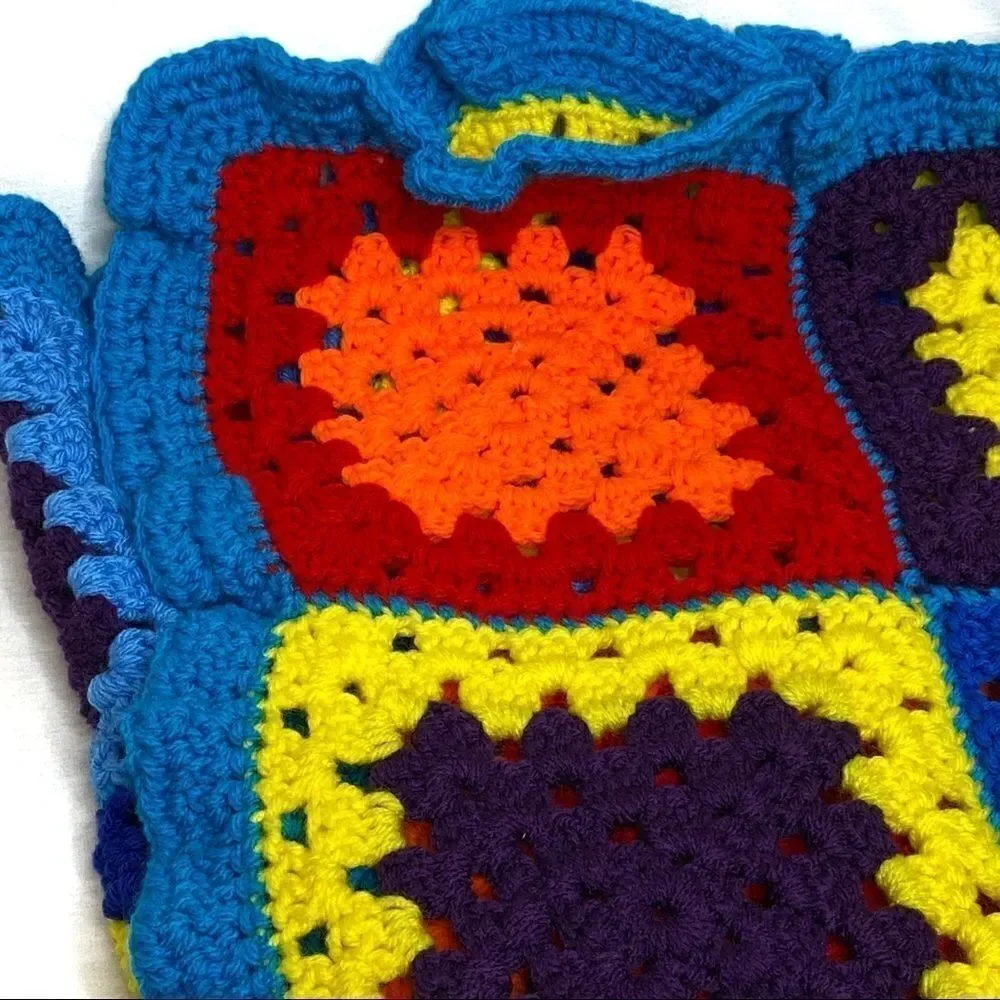 Hand crocheted bright multi colored Afghan size 56” X 31”